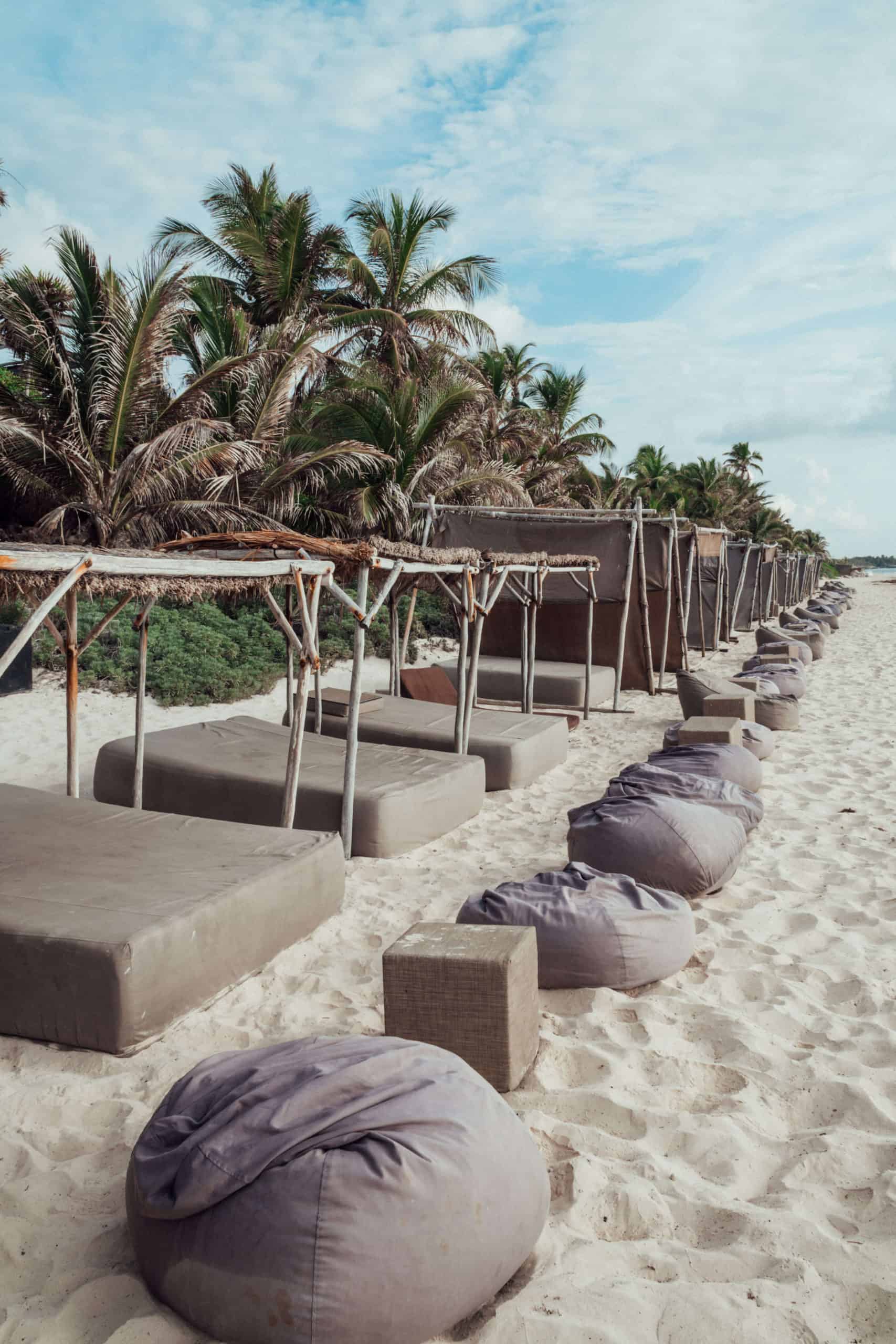 Beach chairs at Playa Papaya Project in Tulum, Mexico