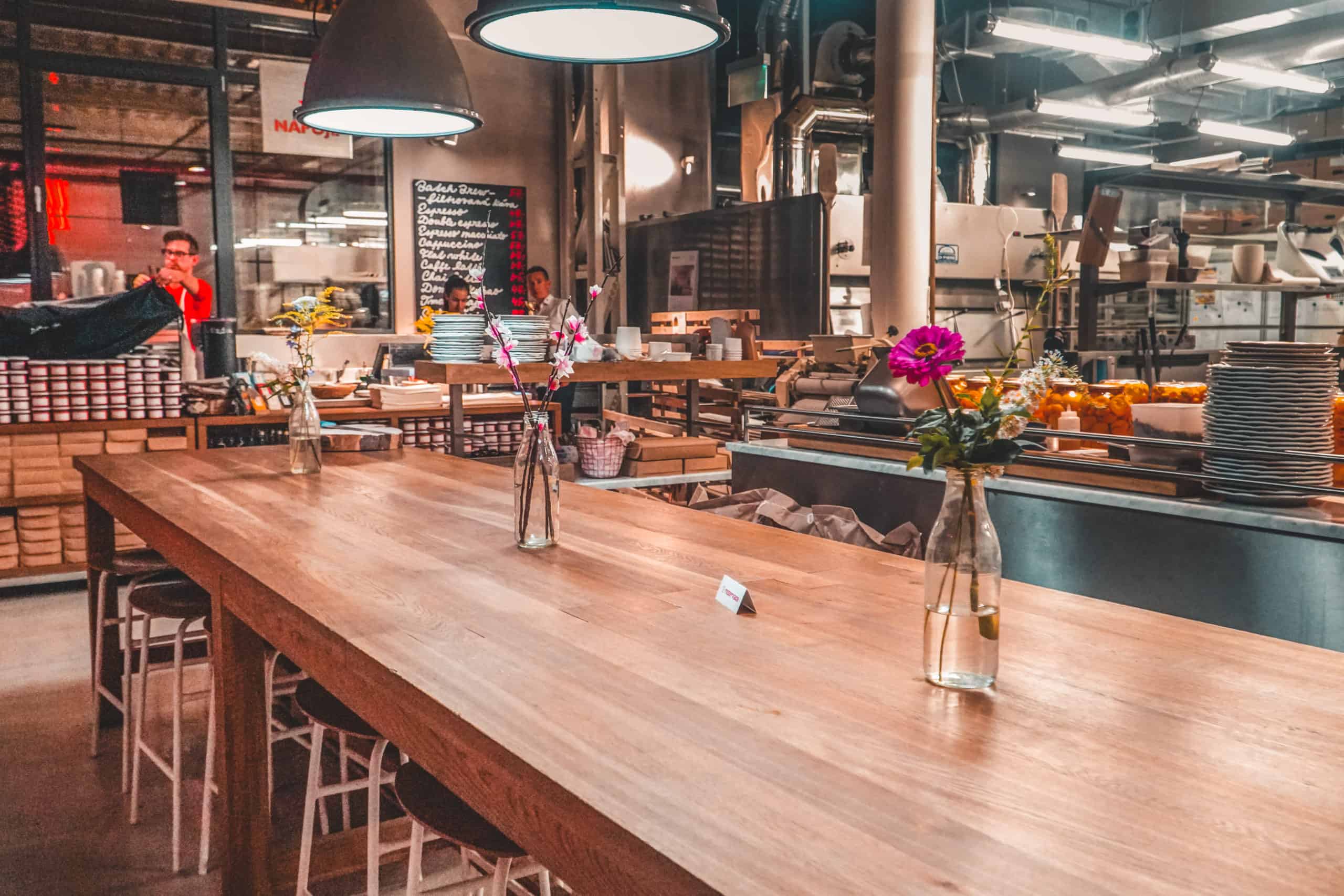 Community table dining room at Eska restaurant in Prague