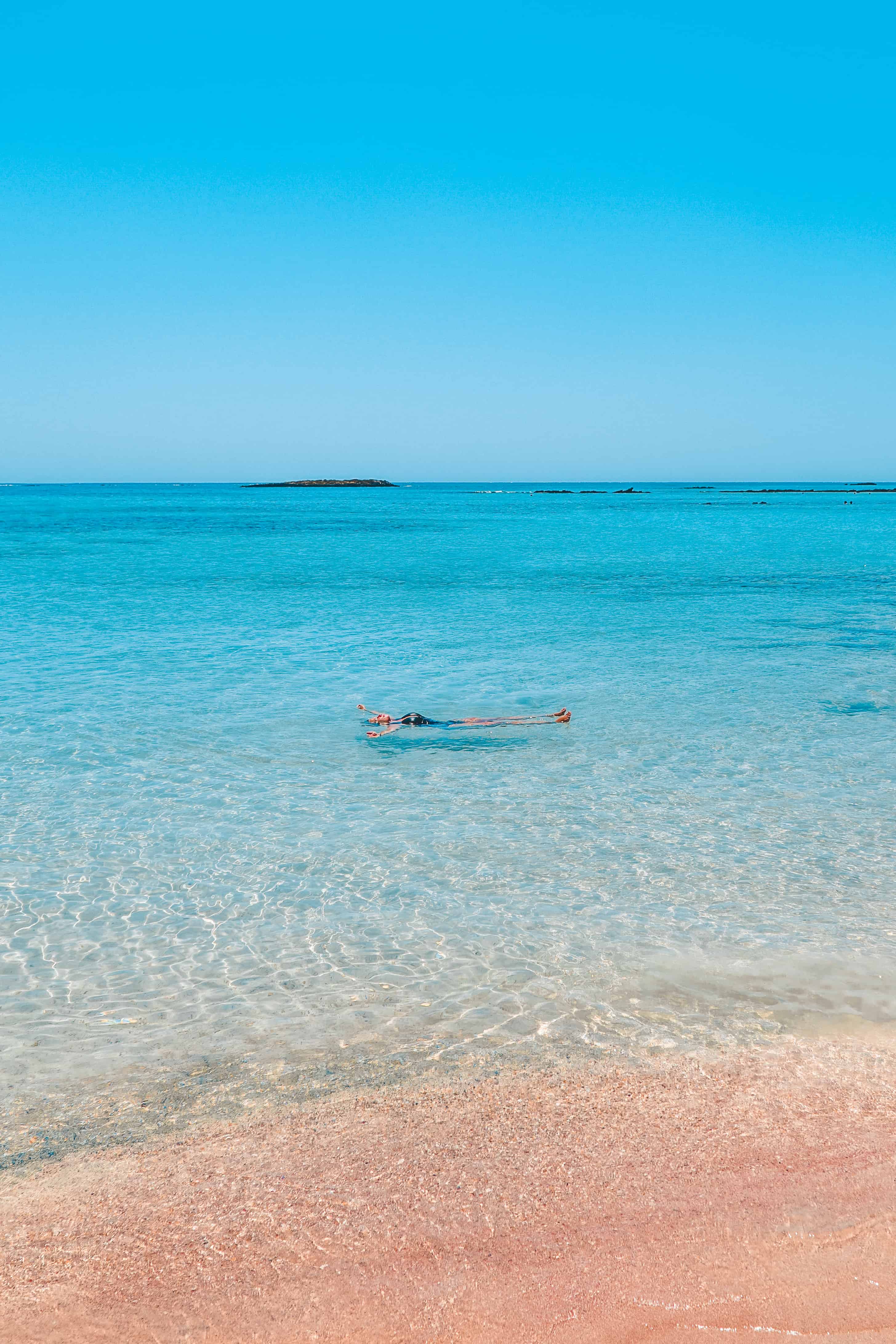 Floating in the sea at Elafonissi Beach in Crete, Greece