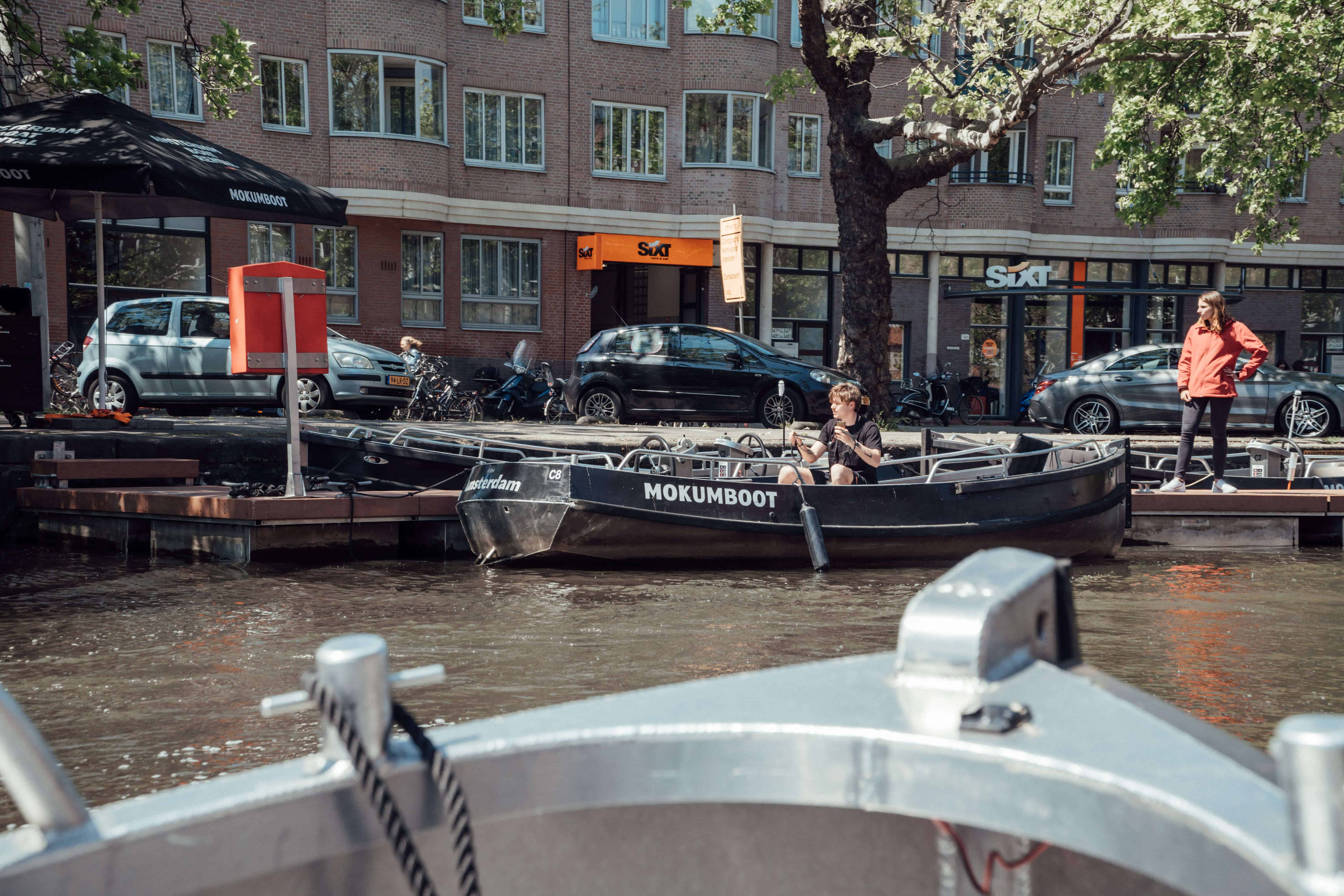 View of the canal | HOW TO EXPLORE AMSTERDAM BY BOAT | The Republic of Rose