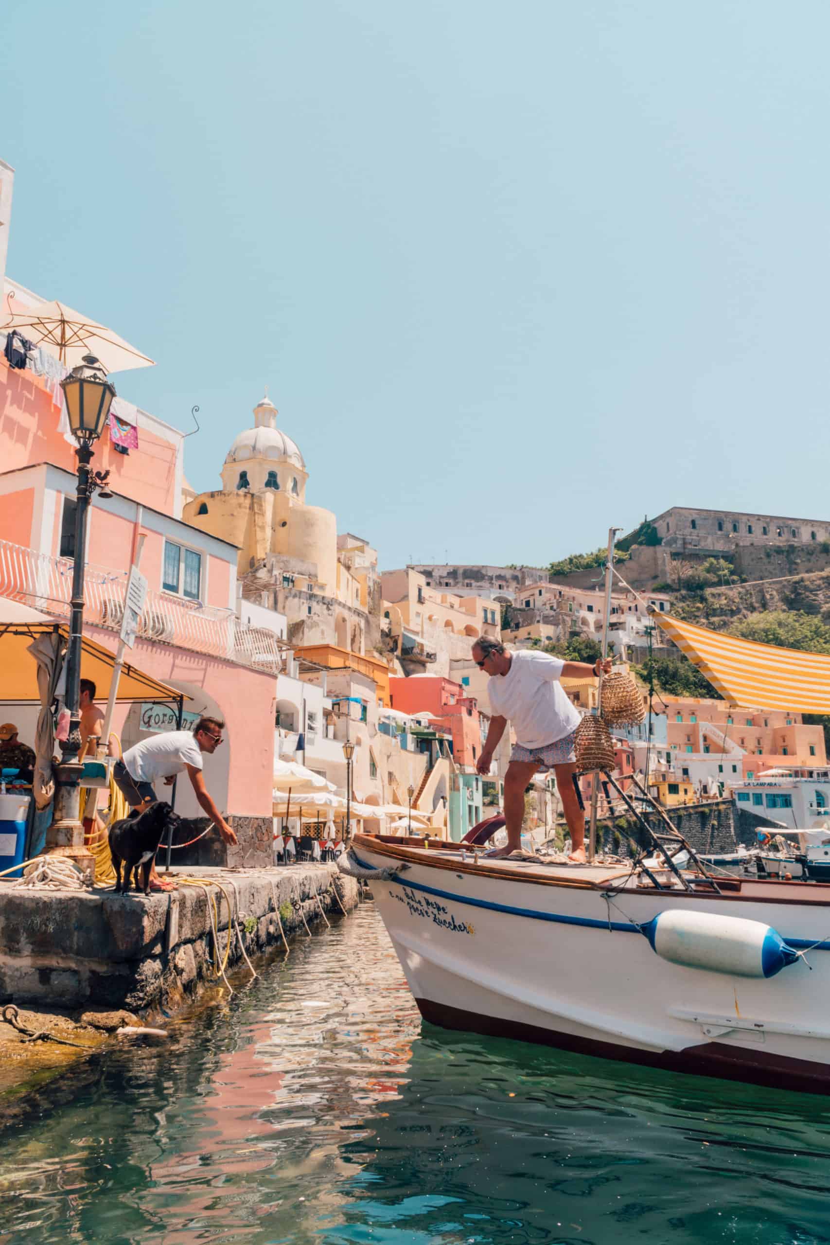 Fishing boats in the marina on Procida island in Italy