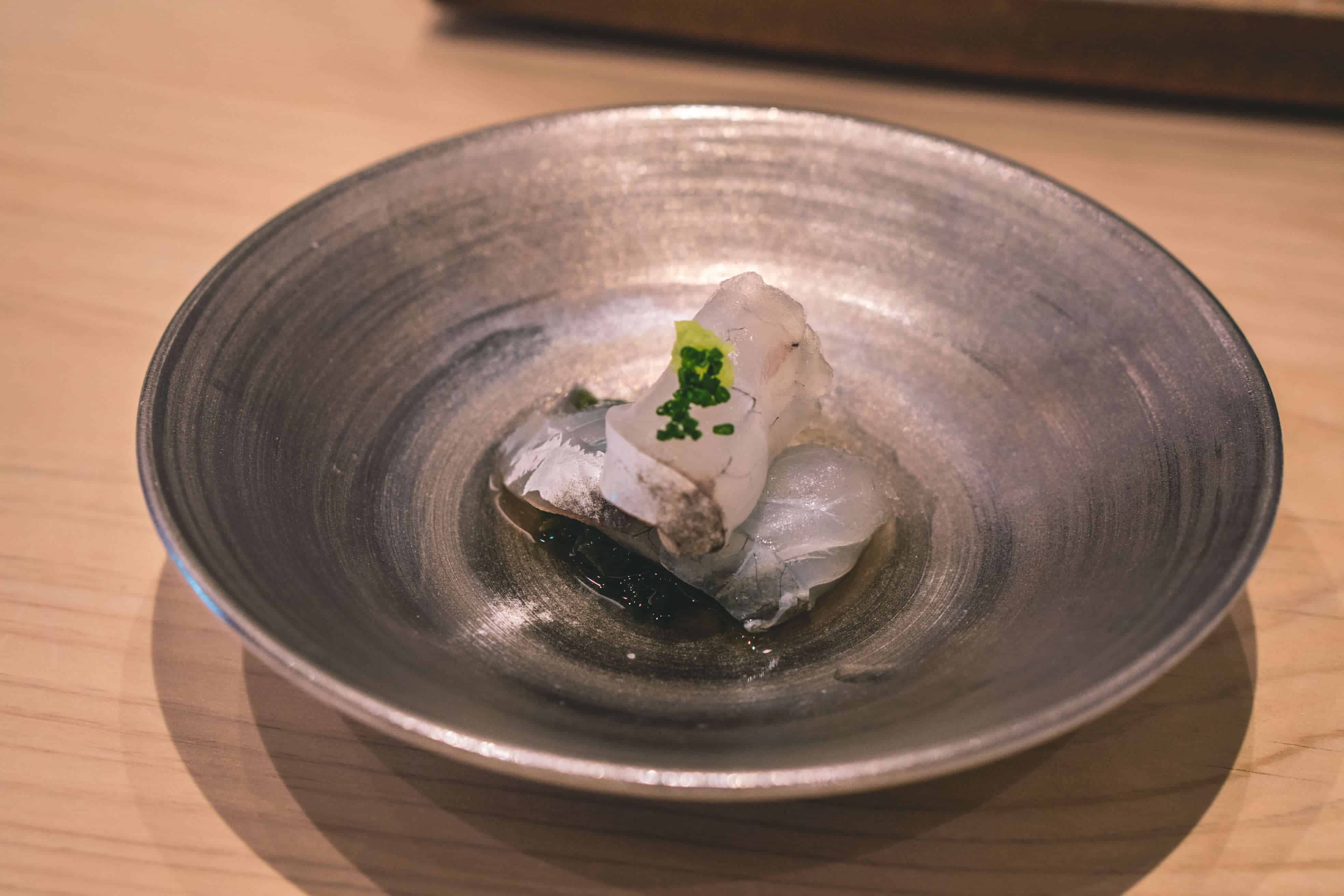 Japanese flat head fish sashimi topped with chopped chives | Dining at Sushi Ginza Onodera in Los Angeles, California