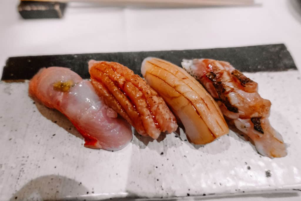 Kinmedai (or golden eye snapper), toro (or tuna belly), kamasu (or barracuda) and butter fish nigiri | Dining at Hanare Sushi in Costa Mesa, California