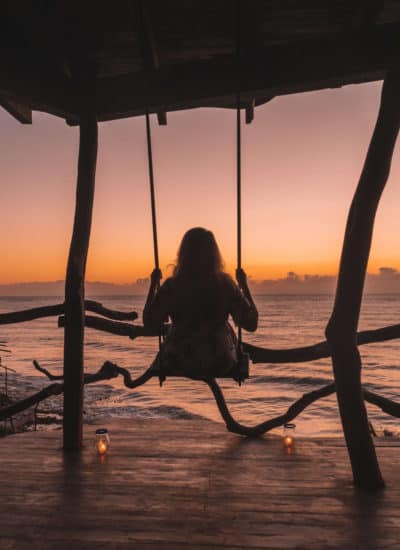 Swinging into the sunset at Azulik in Tulum, Mexico