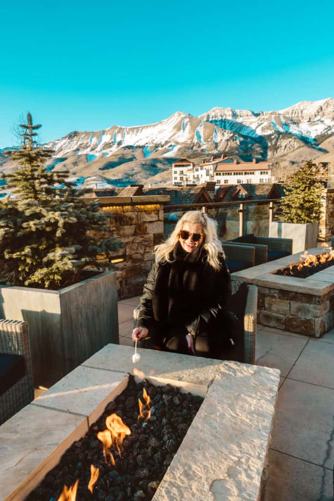 Roasting marshmallows at Madeline Hotel | What to Pack for Telluride