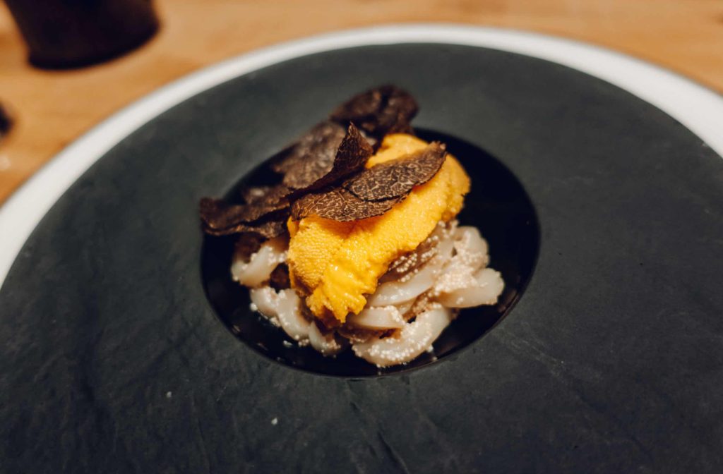 Uni pasta made with Santa Barbara sea urchin, fish egg, udon noodles and topped with freshly shaved truffle