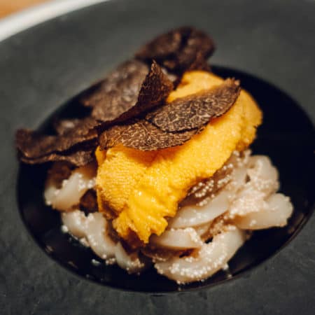 Uni pasta made with Santa Barbara sea urchin, fish egg, udon noodles and topped with freshly shaved truffle
