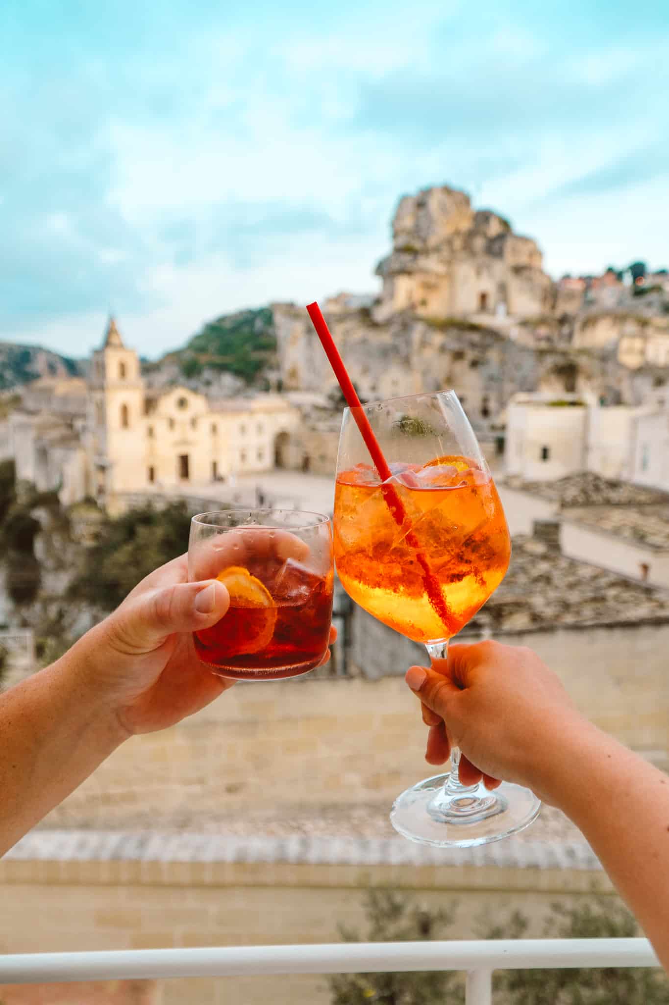 Cheers-ing drinks in Matera, Italy