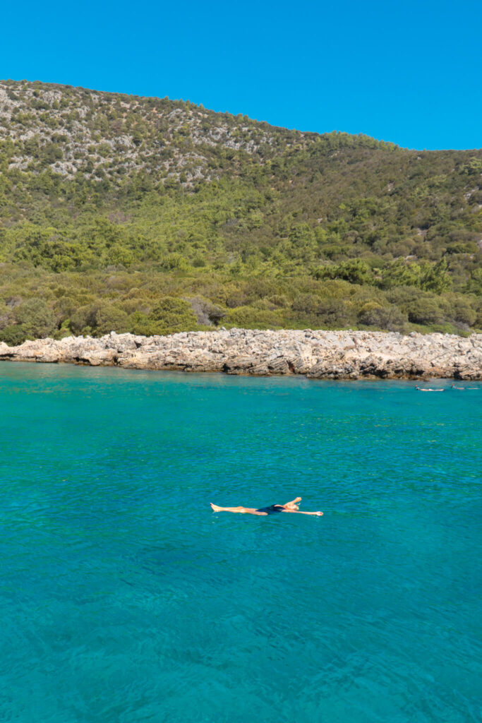 Floating in the sea off Kara Ada Island near Bodrum, Turkey