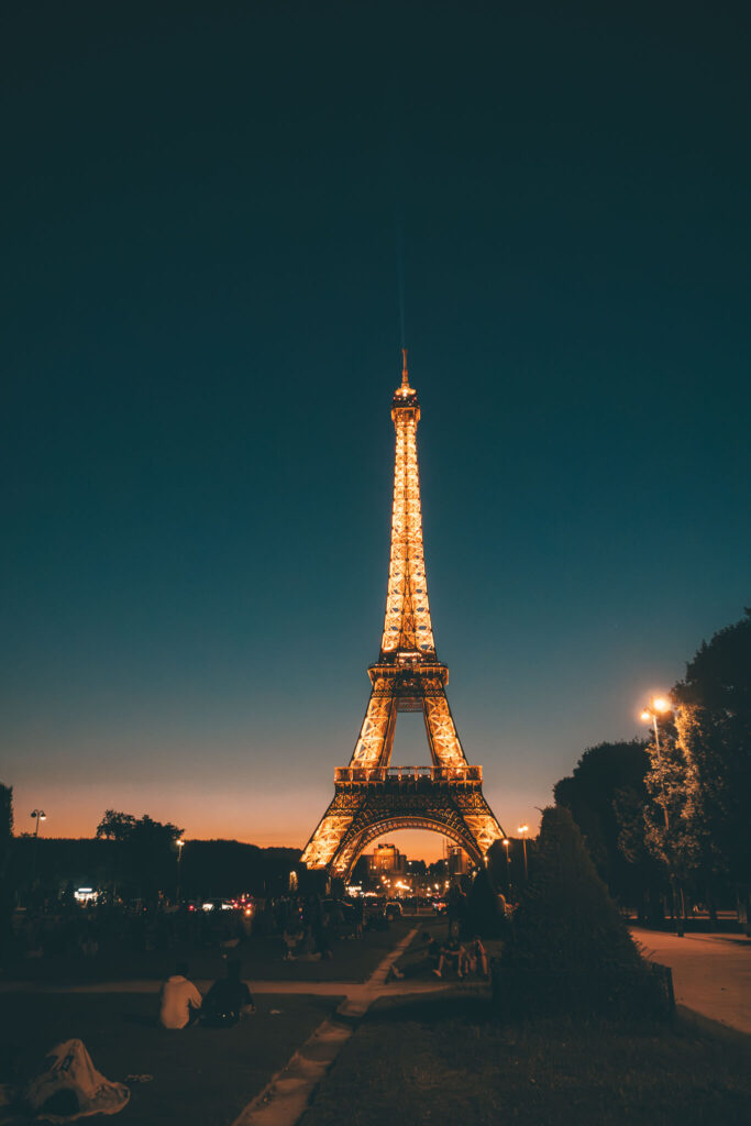 Eiffel tower lit up at night