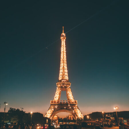 Eiffel tower lit up at night