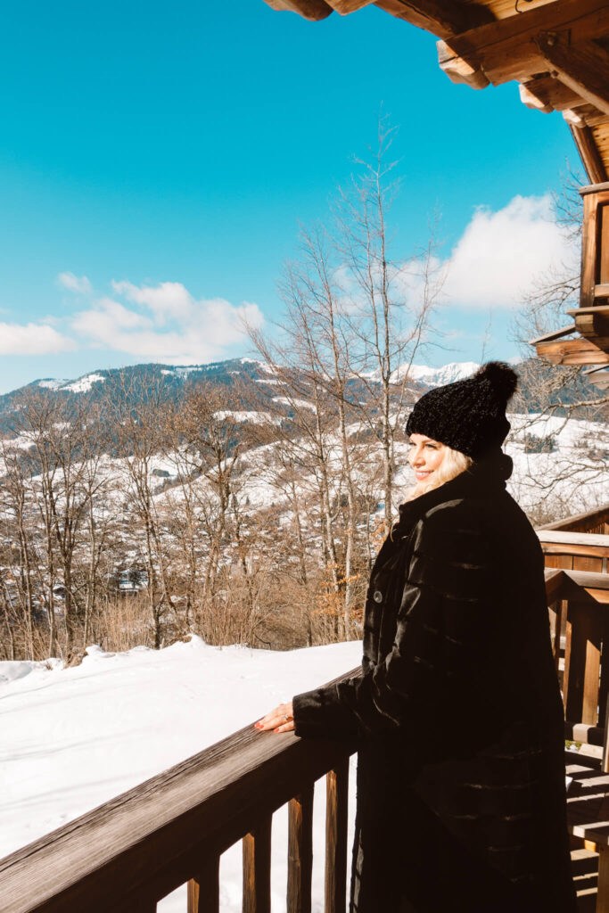 Taking in the views from the balcony at Les Chalets du Mont d’Arbois