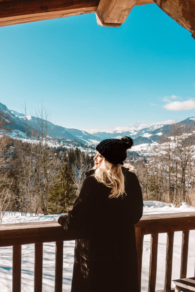 Taking in the views from the balcony at Les Chalets du Mont d’Arbois