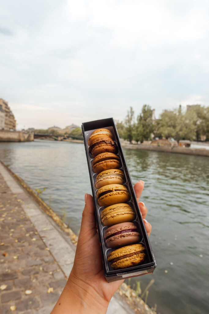 Enjoying macarons from Pierre Hermé on Île Saint-Louis