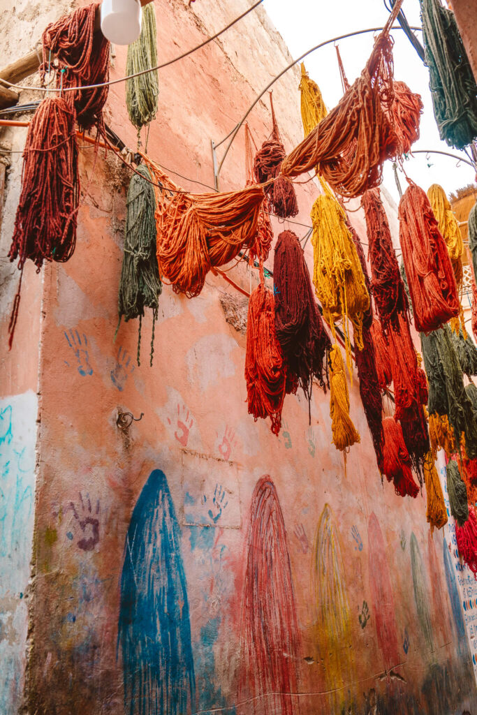 Freshly dyed wool hanging in the souk of Marrakech