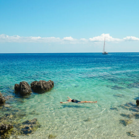 Floating in the sea at Nobelos beach club